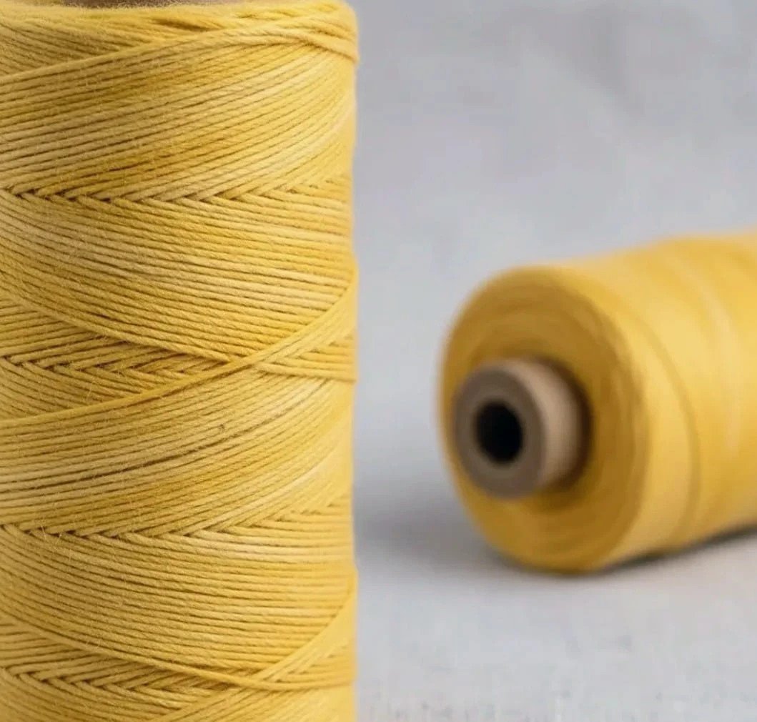 Rollo hilo de algodón reforzado amarillo x 300gr aprox
